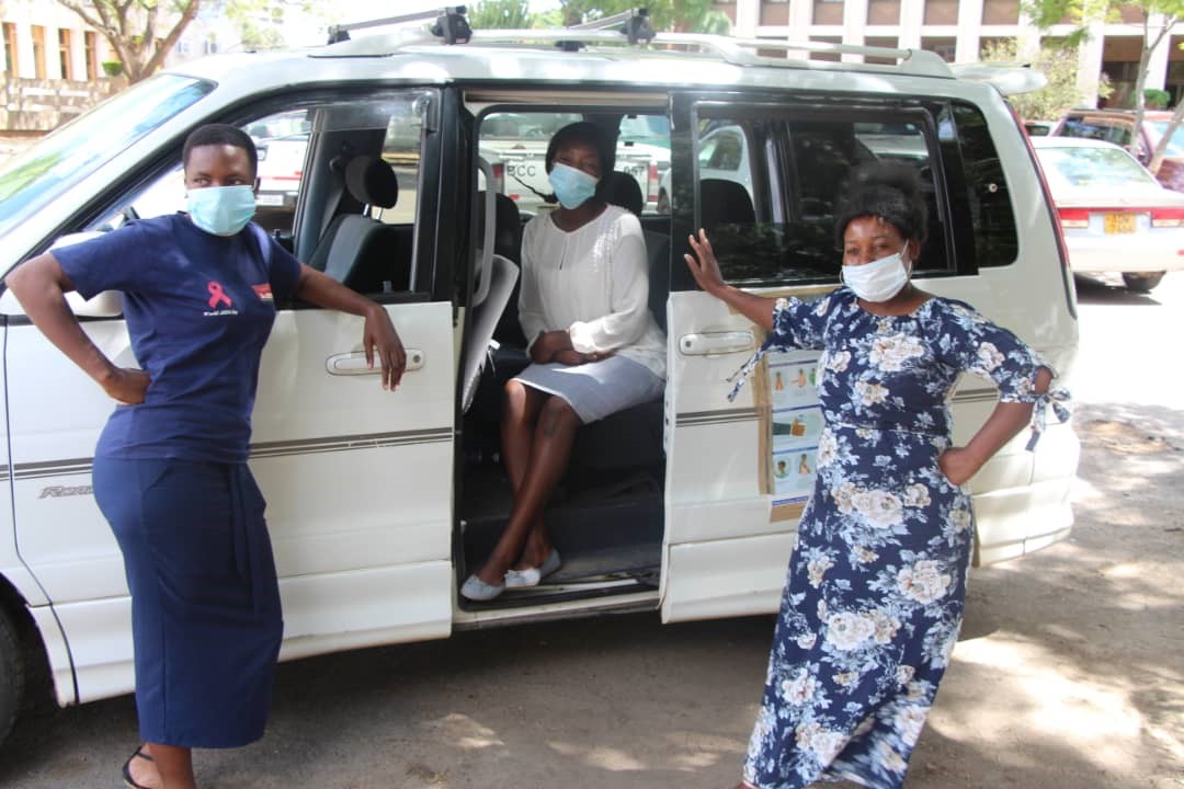 Team members with the project vehicle