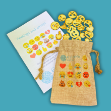 Emotional wellbeing booklet with bag of wooden emoji cutouts